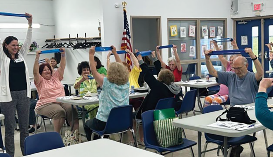 facilitator and adult students in classroom