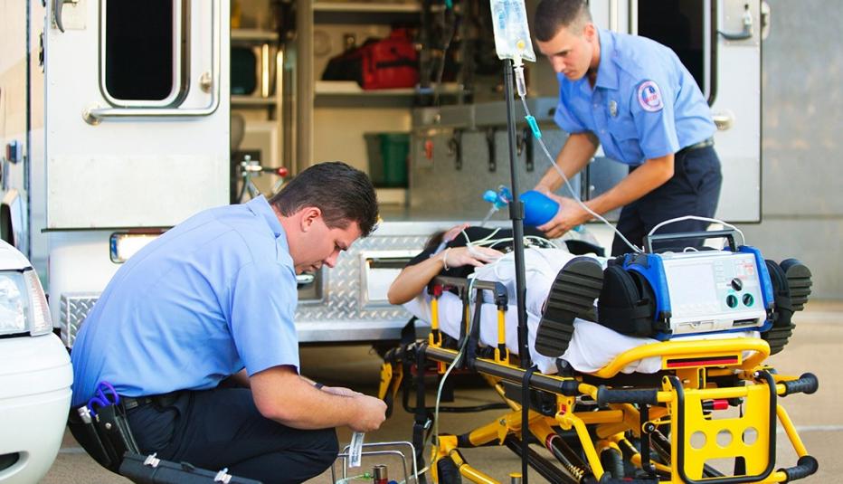 Men providing emergency medical services