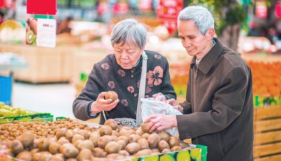Older Asian Couple Grocery Shopping