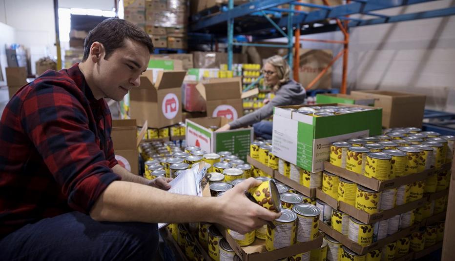 Stocking Cans in the Grocery Store