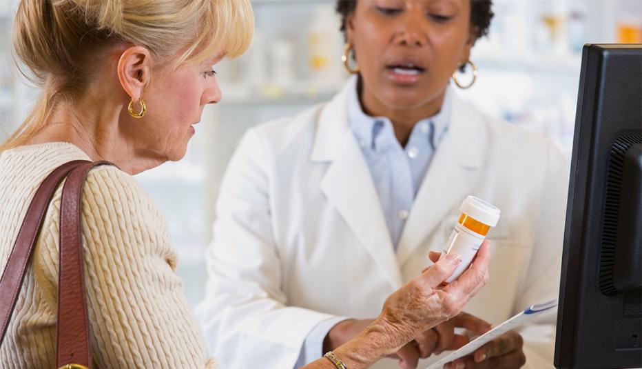 Customer talking to pharmacist 