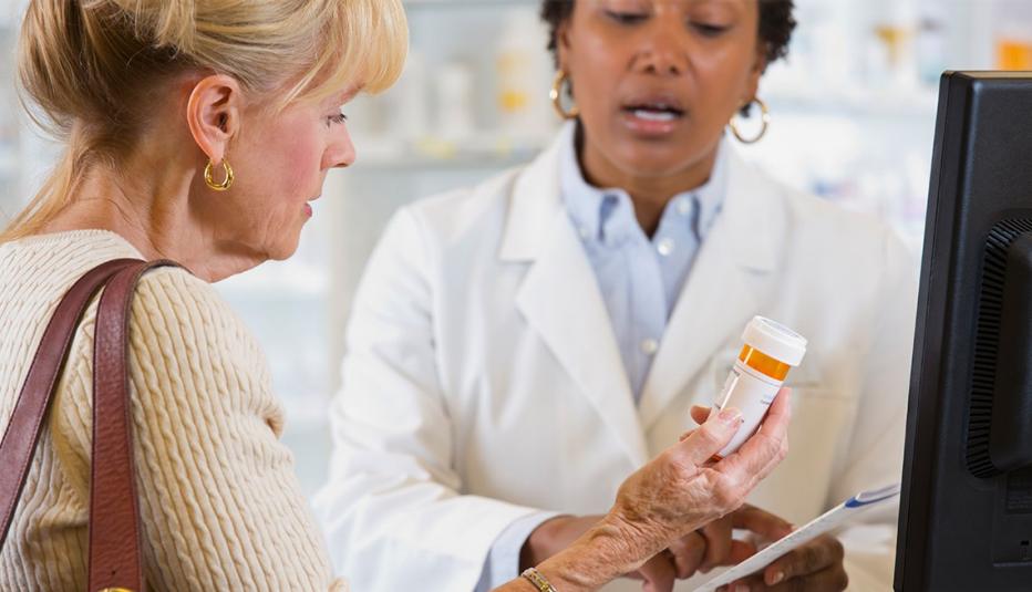 Prices for Top Medicare Part D Drugs Have Nearly Doubled Since Entering the Market Older customer talking to pharmacist