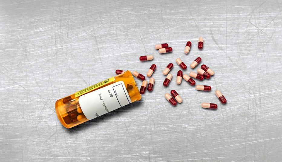 RX pharmacy prescription bottle of pills