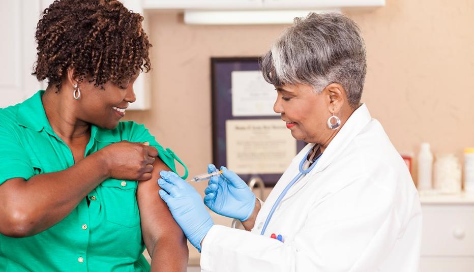 Older woman receiving vaccination