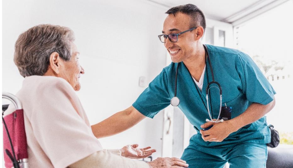 Nurse and patient in nursing home