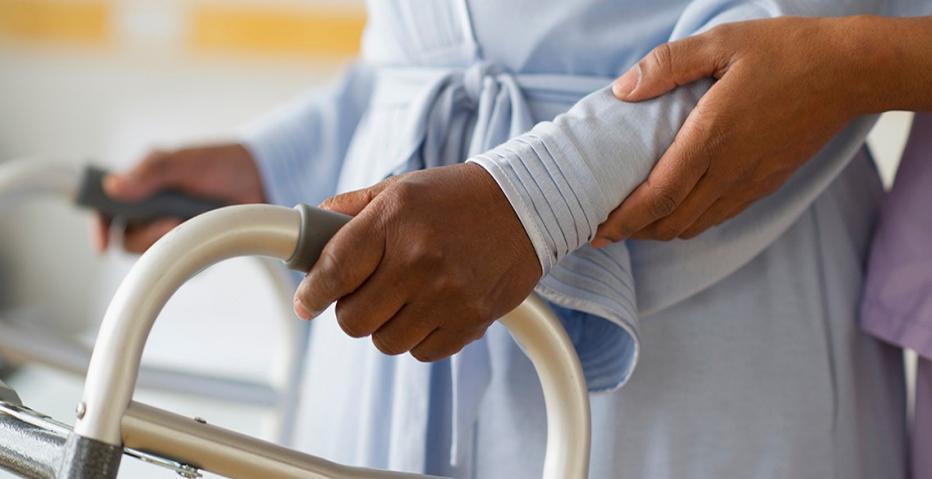 Caregiver Helping Older Adult Caregiver Helping Older Adult