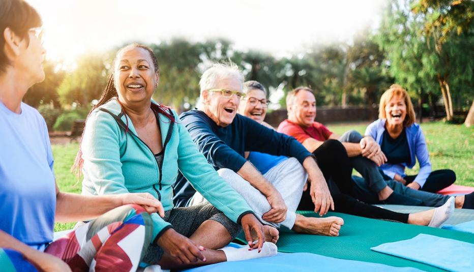 Older members of yoga class socializing outside