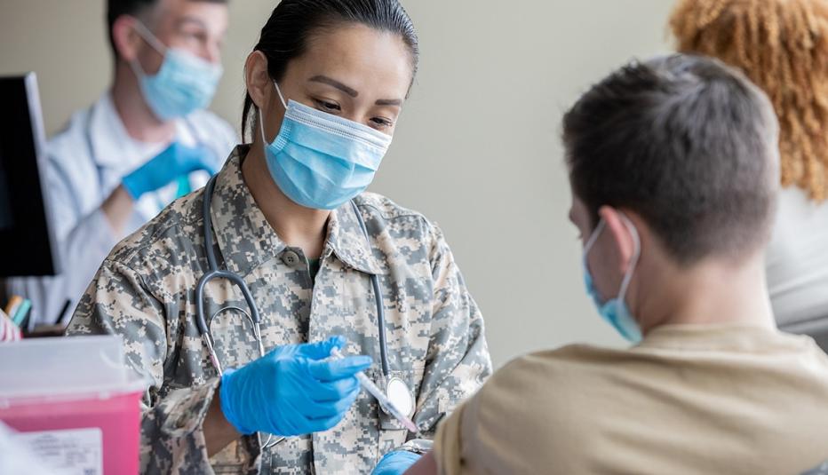 Military Doctor Gives a COVID-19 Vaccination