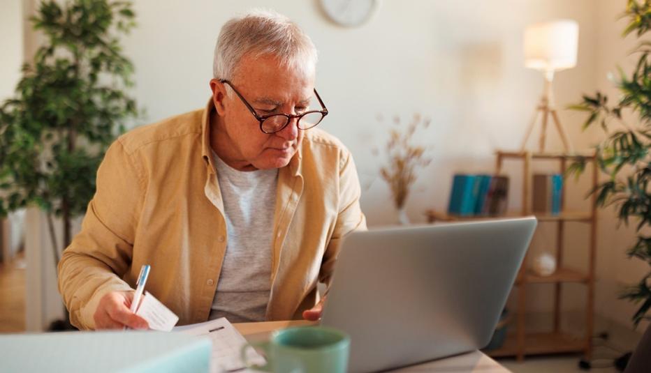 Older man using laptop