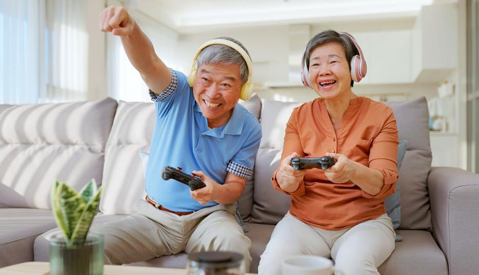 Older couple playing a video game