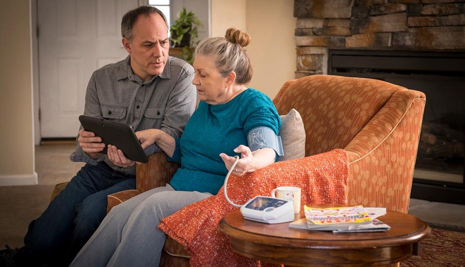 Son and mother during a telehealth session