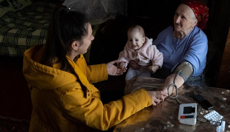 Caregiving with mother, grandmother, and child