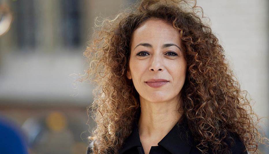 middle-aged woman outside in city