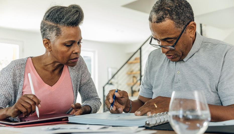 Older couple paying bills