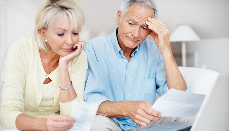 Distressed Couple Reviewing Finances