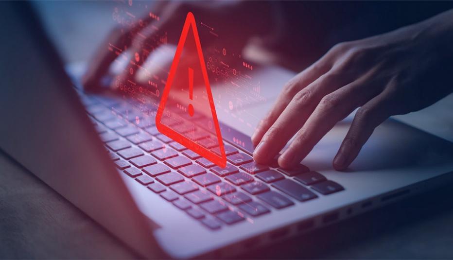 Laptop with fraud warning