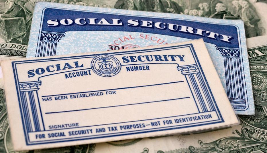 Social Security cards resting on American currency