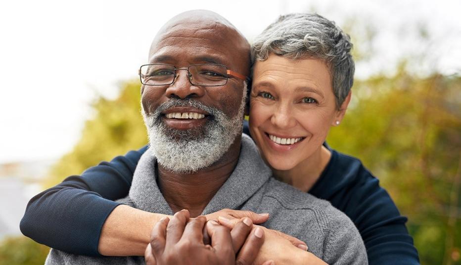 Image of husband and wife hugging