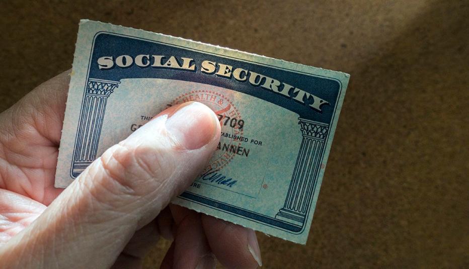 hand holding social security card