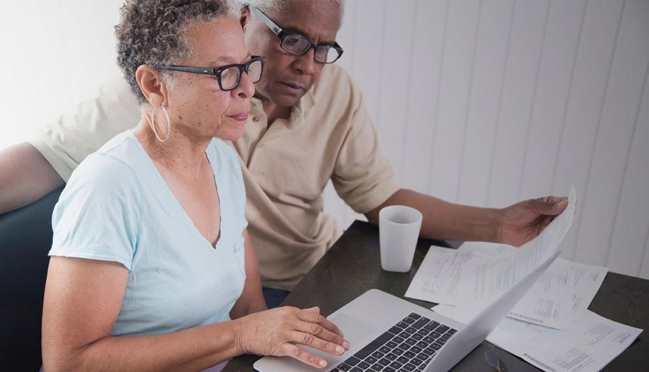 Older couple looking at laptop