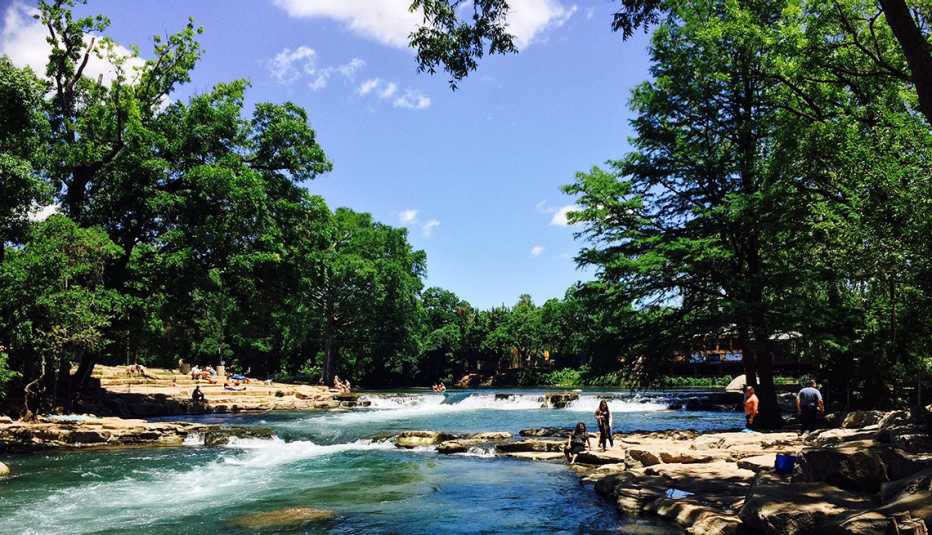 People standing over water