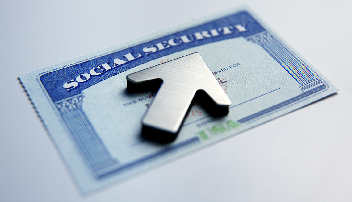 Social Security card with an arrow on top of it pointing up