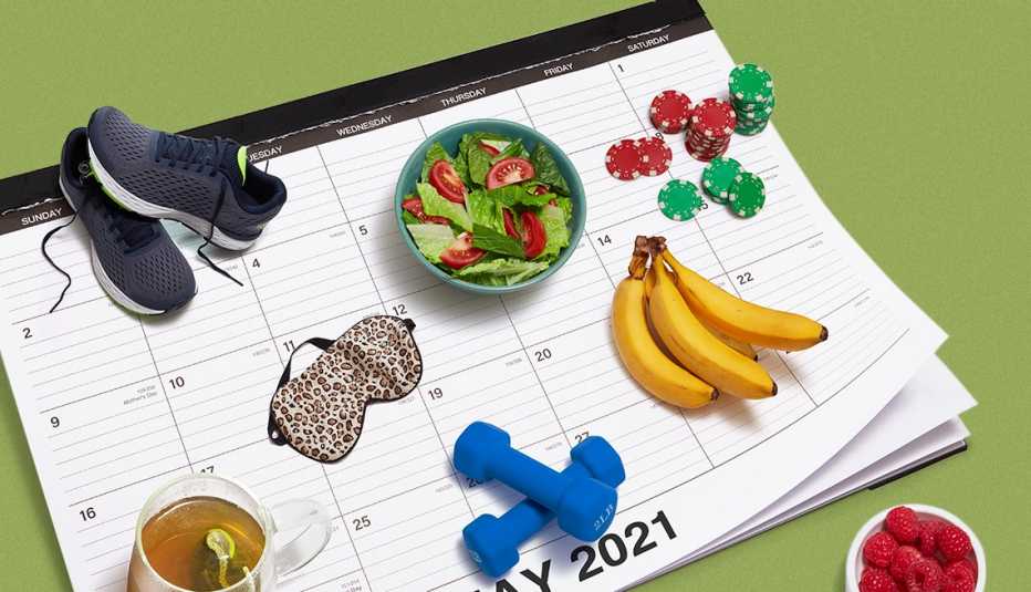 Calendario de escritorio con objetos relacionados a la salud, unas zapatillas de correr, una taza de te, un plato hondo con ensalada, frutas y unas mancuernas