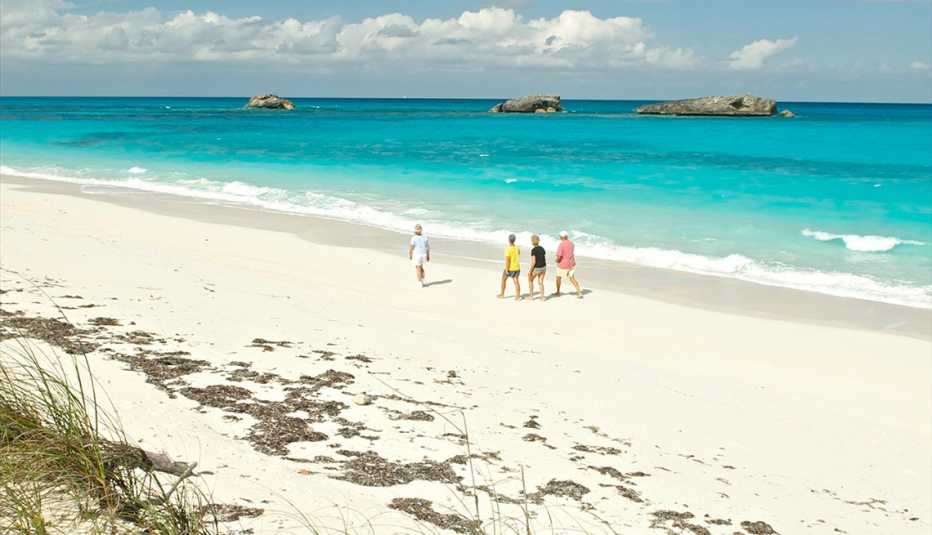 The clean sand and shallow waters of Three Sisters Beach.