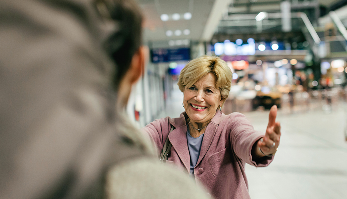 Grandmother welcoming her Grandchild at the airport