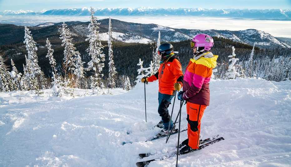 Two skiers at the top of Blacktail Mountain Two skiers at the top of Blacktail Mountain