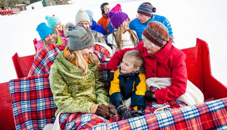 a family taking a sleigh ride