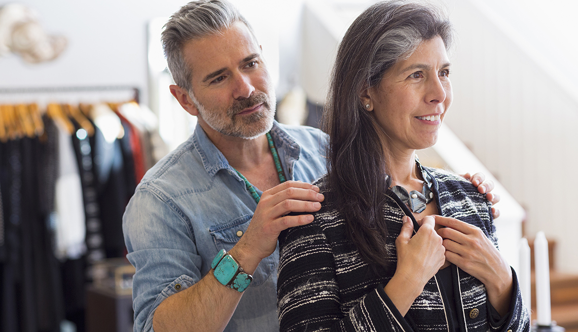 Caucasian Couple Try on Jacket, Clothes Shopping Indoors