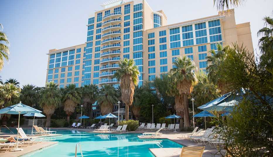 exterior of Agua Caliente with a beautiful pool in front