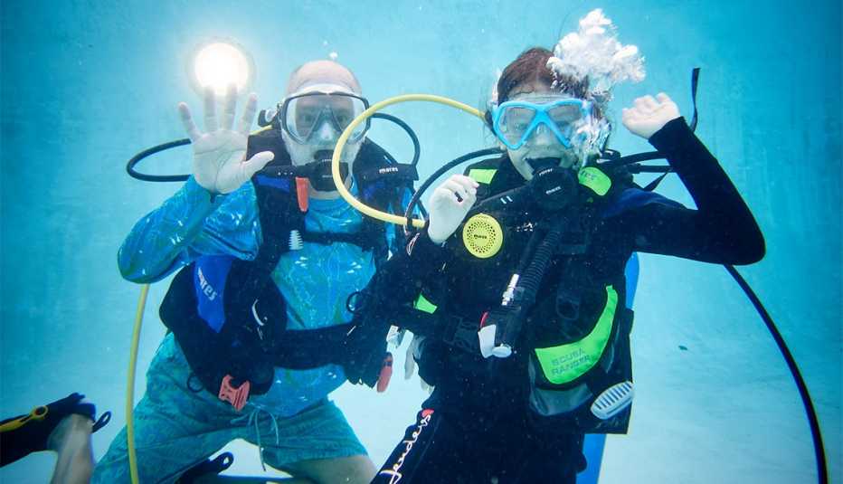 jimmy boylan scuba diving with his nine year old granddaughter rose