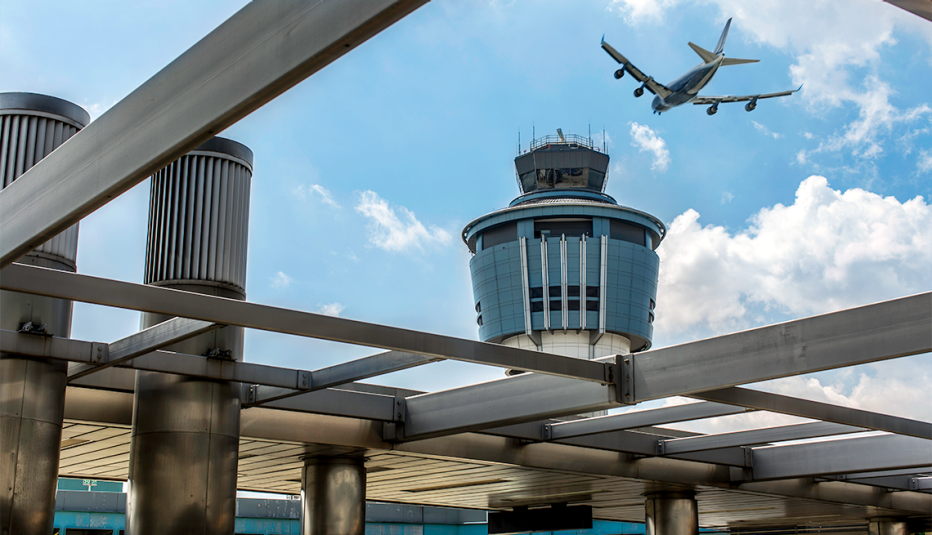 a plane flying over laguardia airport