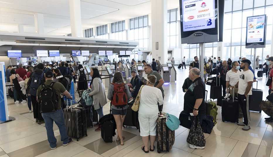 Travelers at LaGuardia Airport (LGA) in Queens on Friday, July 1, 2022