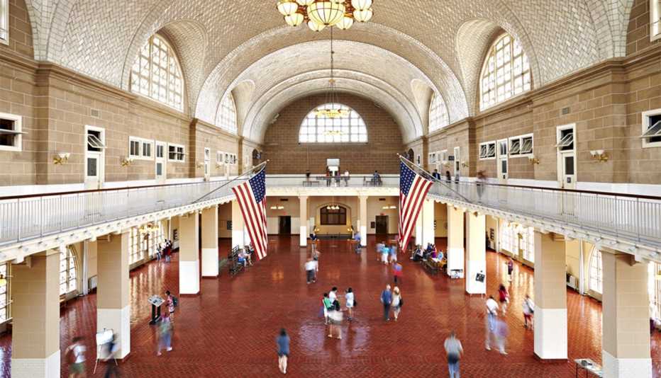 Museum on New York’s Ellis Island People walking around inside museum