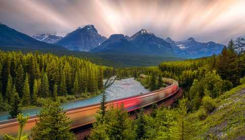 Long Exposure of the train at Morant's Curve, Banff National Park, Canadian Rockies, Alberta State, Canada Long Exposure of the train at Morant's Curve, Banff National Park, Canadian Rockies, Alberta State, Canada