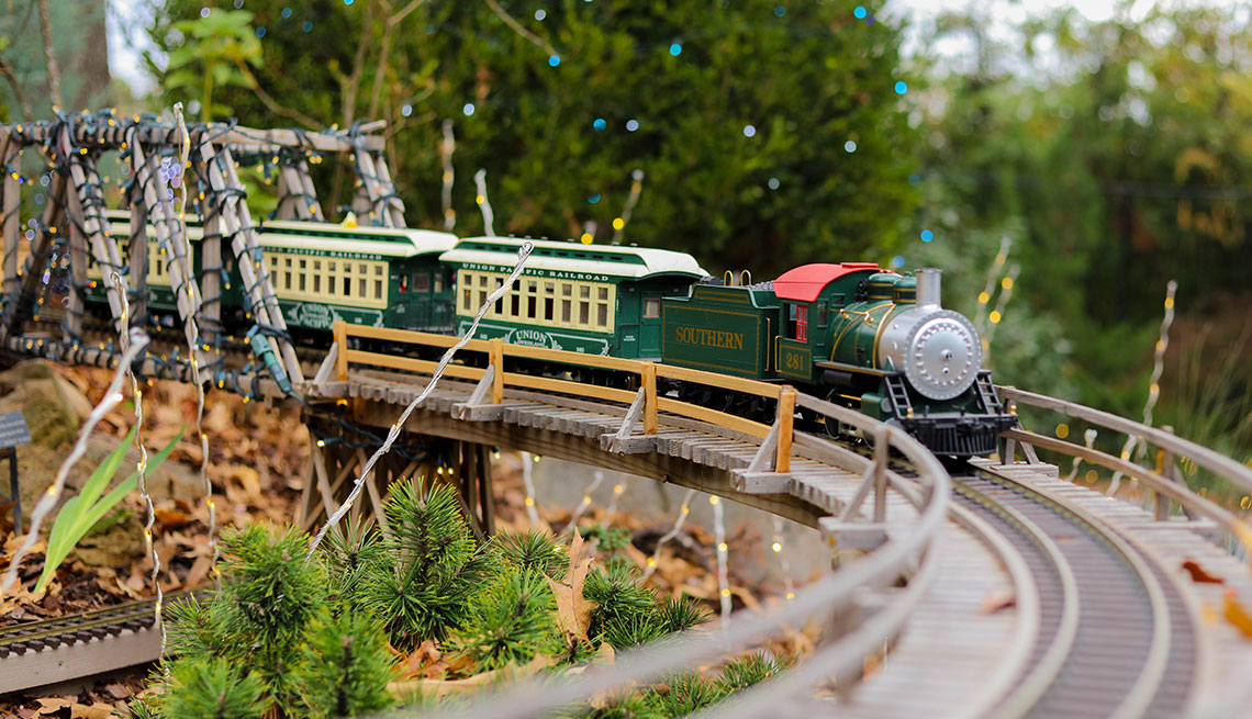 a model train in a festive exhibit in atlanta georgia