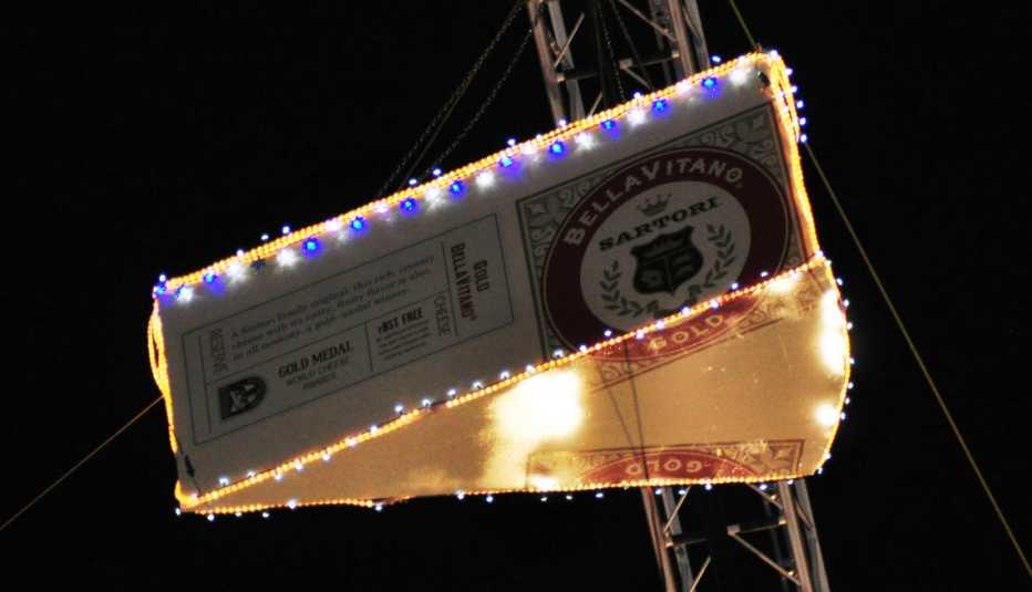 on new years plymouth wisconsin drops a giant wedge of bellavitano cheese