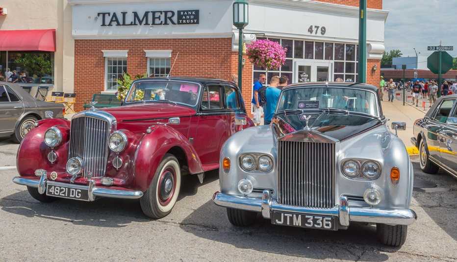 two rolls royce cars on display at the woodward dream cruise car show in birmingham michigan