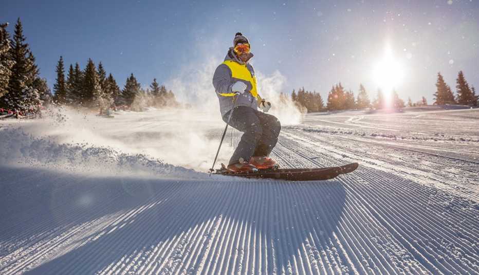 a man skiis down a mountain in santa fe new mexico