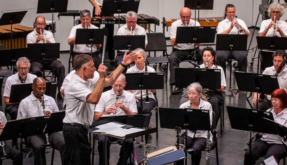 symphony band and conductor at rehearsal