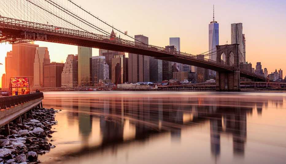 Sunset over lower Manhattan with Brooklyn Bridge, Long Weekend Getaway, Travel 