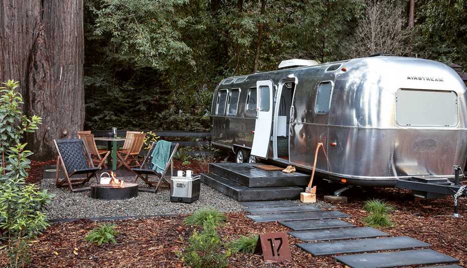 airstream trailer in woods
