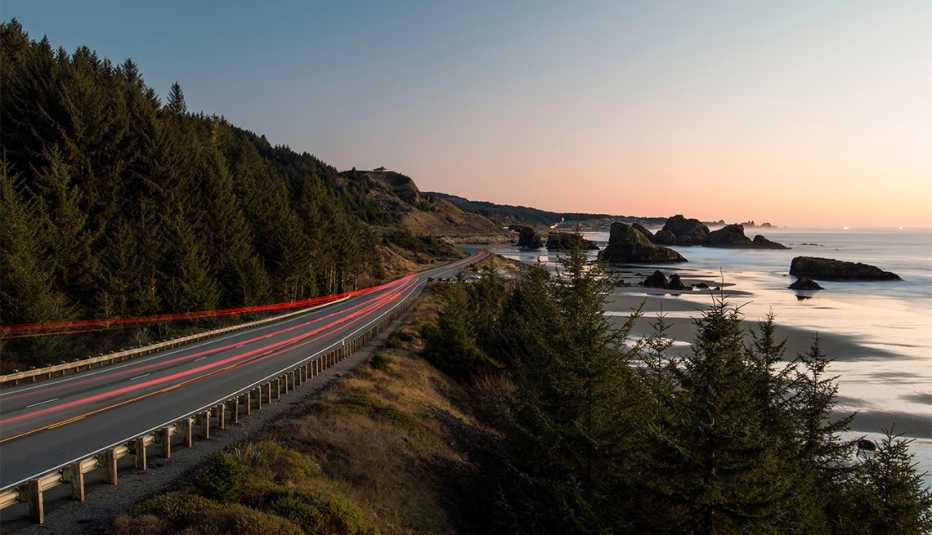 Cars traveling along the Samuel H. Boardman Scenic Corridor in Oregon