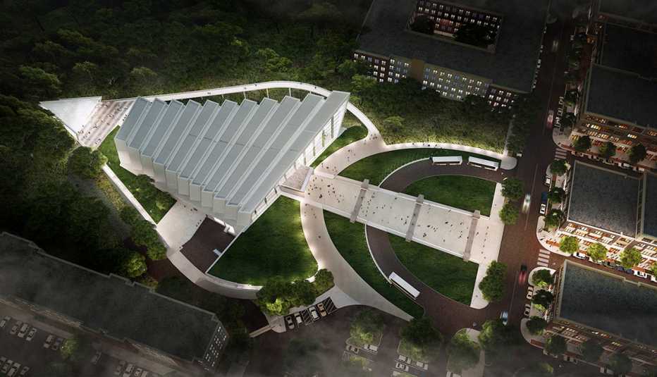 an aerial rendering shows a spear shaped building that will be the future national museum of intelligence and special operations