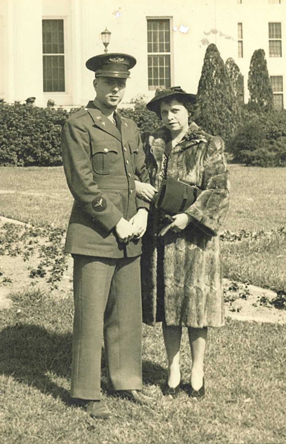 frank murphy stands with his mother