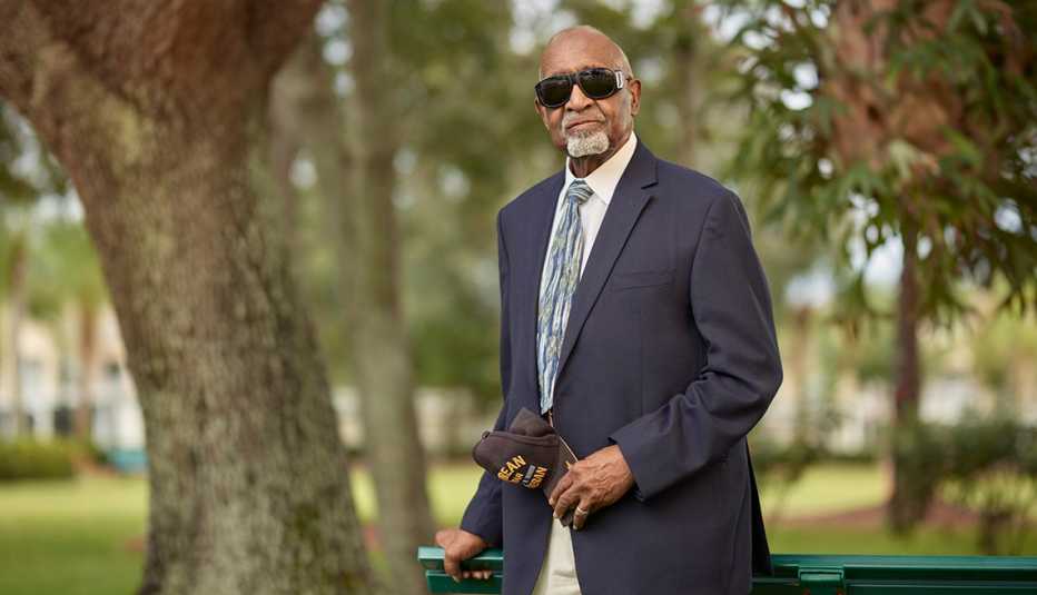 Korean War veteran Walter Dowdy stands in a park