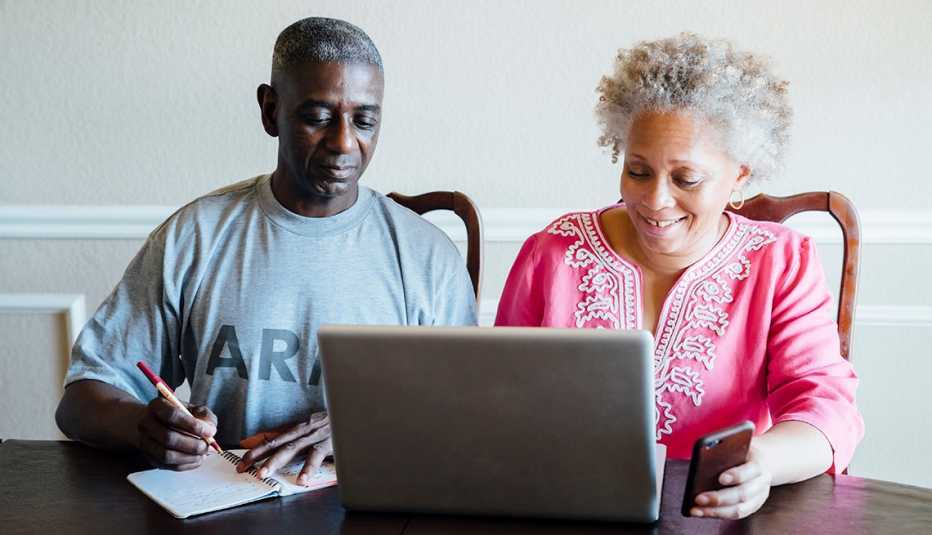 older couple looking at a computer